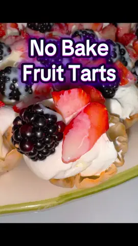 No Bake Fruit Tart Dessert - Thanks to my aunt Anita for this recipe 🤤 2 Packages Phyllo Shell Cups 8 ounces Cool whip 4 ounces whipped cream cheese 1 cup powdered sugar 1 cup diced strawberries  1 cup blackberries Sweetened condensed milk  Into a bowl mix together cool whip, whipped cream cheese, & powdered sugar. Fill phyllo cups with filling. Top with diced strawberries & blackberries. Drizzle sweetened condensed milk on top. ENJOY! #nobakedessert #phyllocupdessert #fruittarts #easydessert #deliciousfood 