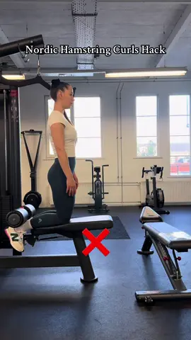 Did you know you can take your Nordic hamstring curls to the next level with one simple tweak?  Trust me, adding a slight hip hinge before starting your reps might seem like a small adjustment, but it can make the exercise feel smoother, safer, and way more effective for your hamstrings.  Here’s the deal…. When you hinge slightly at the hips, you put your hamstrings in a more stretched position. This pre-stretch helps them work harder during the eccentric phase (the lowering part of the curl), which is where all the magic happens for building strength and resilience. Not only does this make the exercise more challenging in the best way possible, but it also reduces your risk of injury by optimizing how your muscles are positioned to generate force.  Another big plus is that the hip hinge helps you keep a neutral spine throughout the movement. If you’ve ever felt your lower back arching too much during Nordics, this tweak is for you. By hinging, you avoid that hyperextension and shift the focus to the hamstrings.  For me, this little adjustment has completely changed how I approach nordic curls. It’s helped me activate my hamstrings more effectively, eliminated unnecessary compensation from other muscles, and made the whole movement feel more controlled as you can see on the video.  If you haven’t tried it yet, give it a go and let me know how it goes.  Wearing @Oner Active  #hack #Fitness #fitnessmotivation #gym #fitmom #momswholift #instafit #gymhacks #motivation #workout #nordichamstringcurl 