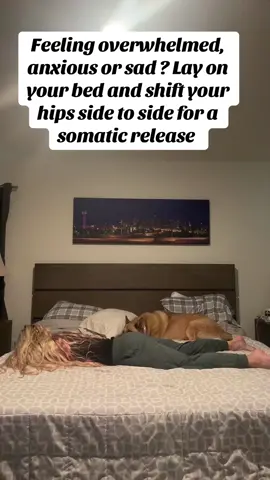 Start slowly shifting hips side to side in a rocking motion to release trapped energy #somaticrelease #trappedenergy #healing #traumahealing #yoga #yogi #lazygirlworkout #bedworkout 