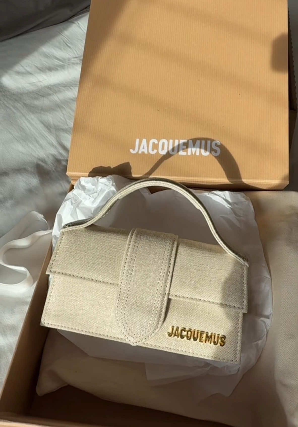 Unboxing my @Jacquemus le bambino in light greige all the way from France. Soooo beautiful! I’m sooooo inlove 🥺💕✨  May this post radiates abundance all year long- for more blessings, more wins and more moments like this 🕊️ #unboxing #firstdesignerbag #grateful #christmasgift #happywifehappylife #fyp #fyppppppppppppppppppppppp 