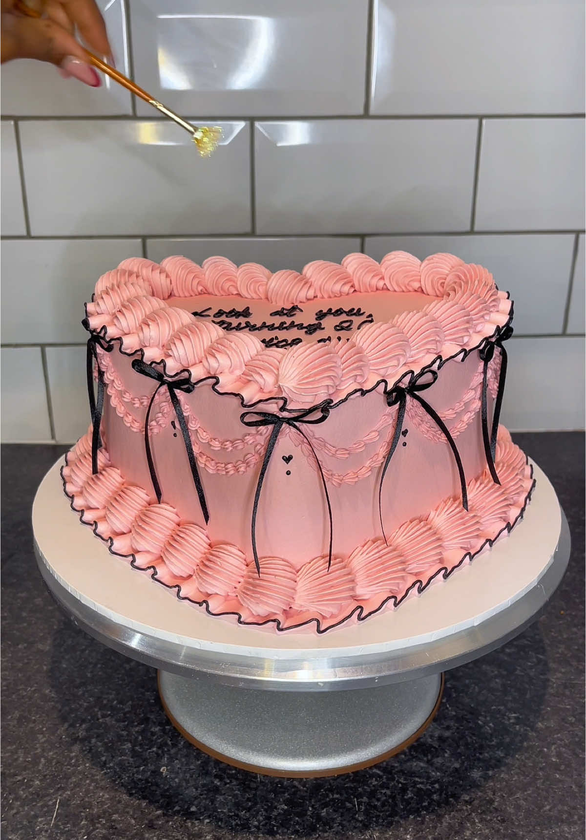 I actually need to learn when to stop 🤦🏾‍♀️ but I still love it! Pink and black heart cake for a boss babe - ebook is available for preorder, link is in my bio! 🖤 . . . #kutiwacakes #cakelikeakutie #cake #cakesoftiktok #SmallBusiness #caketok #caketiktok #cakedecorating #cakedecorator #caketutorial #fyp #viral #manchestercakes #ganache #swissmeringuebuttercream #heartcake #blackpink #vintagecake #birthdaycake #piping #satisfying 