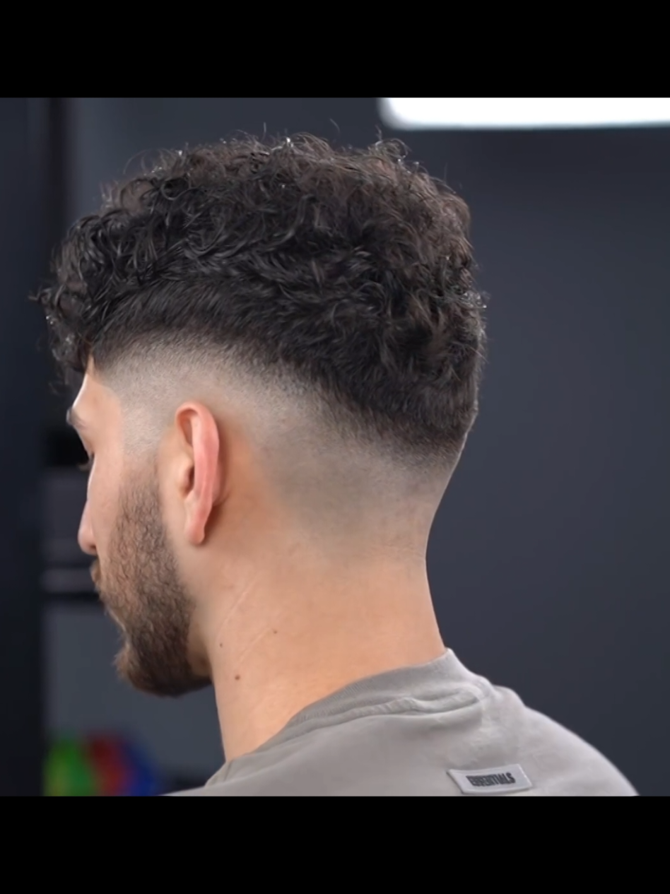 Curly Hair + Mid Fade Haircut ✨” #haircut #hairstyle #GlowUp  #trending #hair #barber #fade  #hairtok #fyp #hairtutorial  #shaving #longhair #barberlife #taperfade #lowfade #skinfade #dropfade #curlyhair #buzzcut #hairtransformation #haircolor  #mullet #barbershop #midfade #fringe #braids #usa #america #newyork #france #españa #italy #Canada #germany #uk 