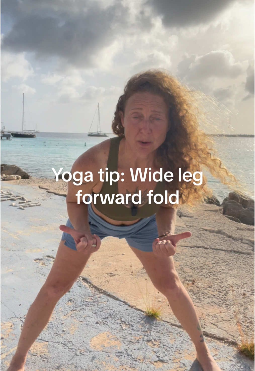 Take one minute to break down this yoga pose. Wide leg Ford fold can be typically approached in two ways. For those of you that are very flexible already you’ll drag the heels towards each other. For those of you that struggle with length in the back of the body, you’ll take a wider stance and widen the heels away from each other.  Let me know if you tried this! I have a YouTube channel. I think you’d enjoy! Thanks for practicing with me here.  #Yoga #YogaPose #BeginnerYoga #BeginningYoga