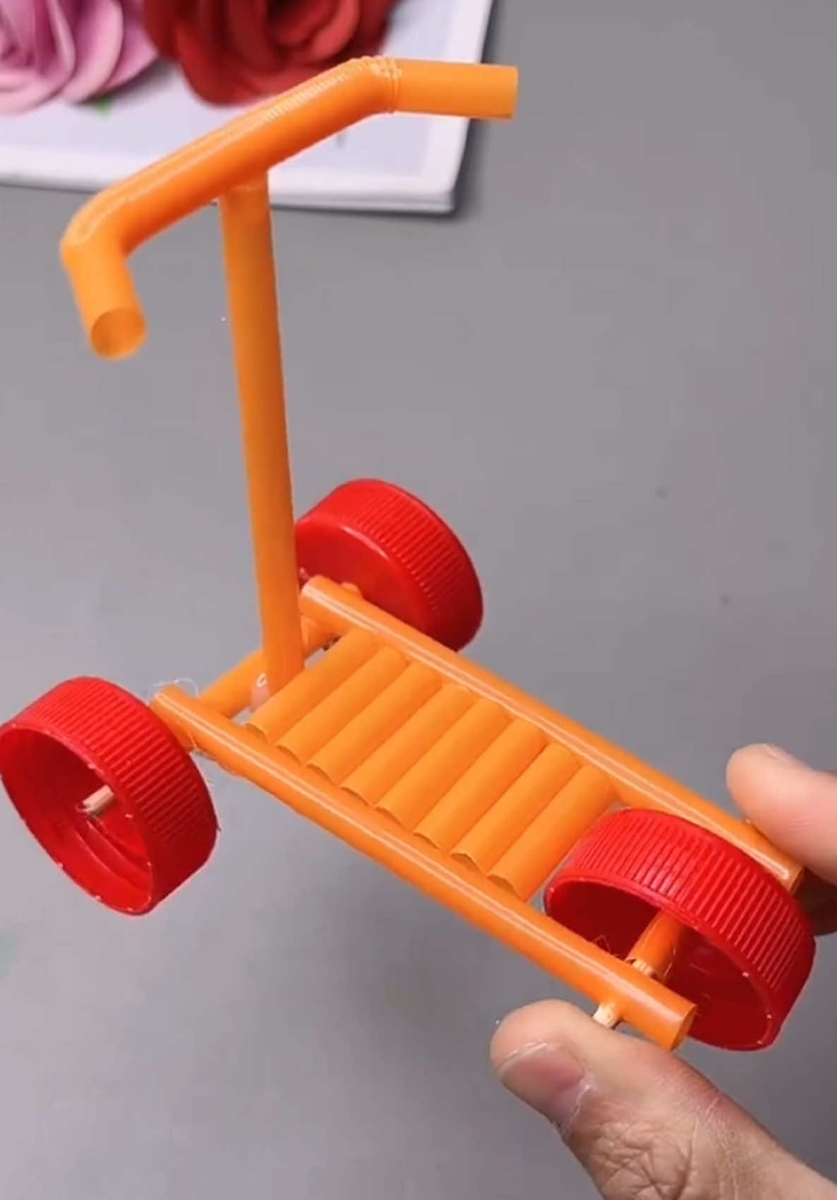 Make a mini scooter with bottle caps and straws. It's fun and interesting. Come and have a try #kindergarten handmade #handmade diy #creative handmade #Handmade #Crafts #KidsActivities #CreativeKids #FunWithKids #ArtsAndCrafts #CraftingWithKids #KidFriendly #Upcycle #HomemadeCrafts #ParentingTips #FamilyFun #InstaDIY #KidsCrafts #ArtForKids #KidsArt #ArtWithKids #CreativeArt #KidsImagination #KidsCreativity #STEMActivities #ArtEducation #MomLife #CraftsForKids #KidsFun #KidsArtProjects #PlayfulLearning #CreativeParenting #artdaily #DIY911