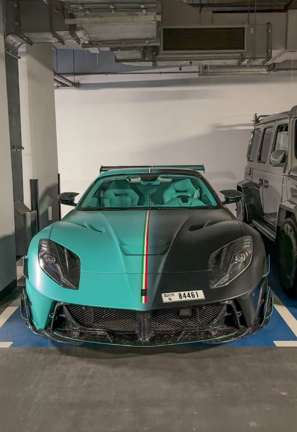 Jaw-dropping two-tone color combo🩵🖤#dubaicars #carspotting #ferrari812 #mansory #tempestaverde