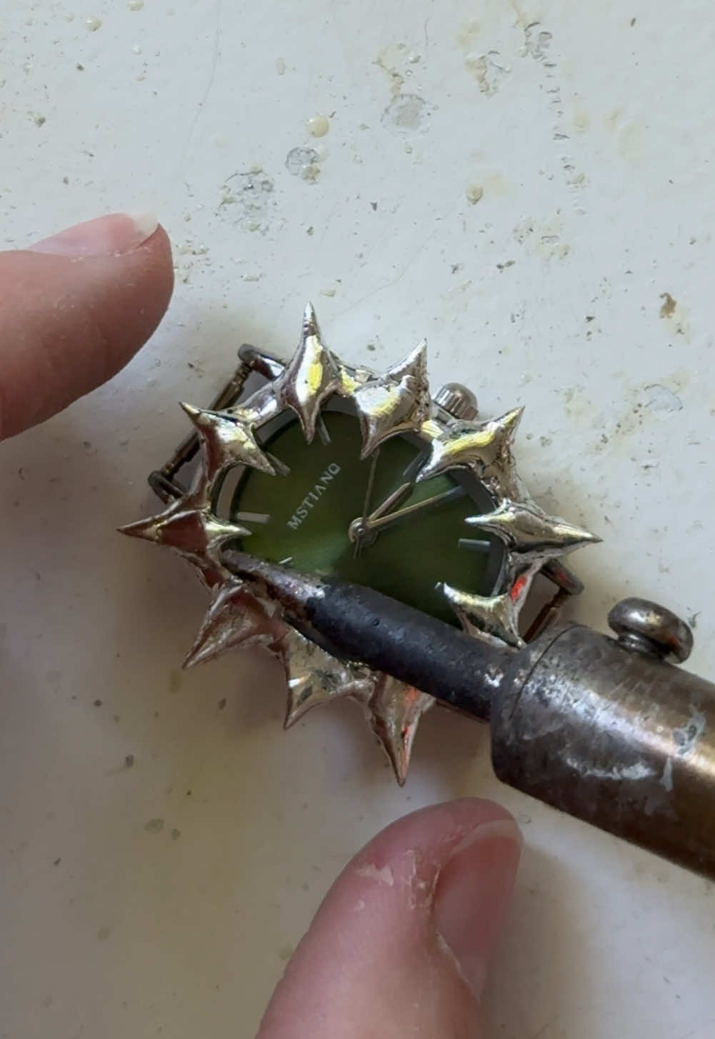 Spiked green crystal watch  #jewelry #jewellerytok #handmadejewelry #watches #watch #jewelleryprocess #jewelrymaking #soldering 