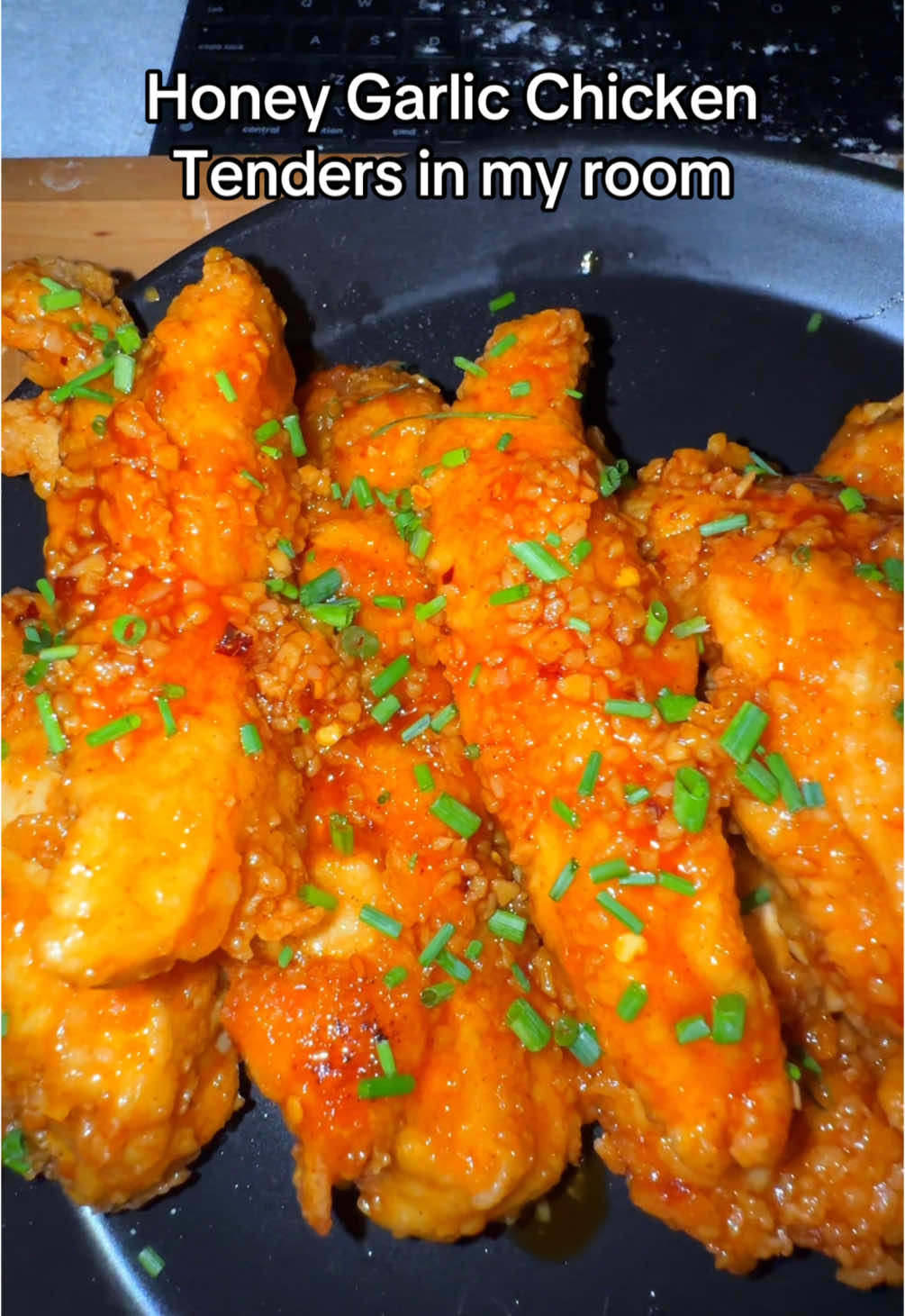 Making Hot Honey Garlic Chicken Tenders in my room! 🍗🥵🍯 — Too bomb, I could eat these every day😩 Ingredients needed 👇  • Chicken breast • Flour • Corn starch (optional) • Eggs • Water • Frying oil • Salt & Pepper • Smoed paprika • Onion powder • Garlic powder • Red pepper flakes • Butter • Garlic • Honey • Siracha  • Soy sauce • Mayo • Sour cream • Ranch seasoning packet • Buttermilk  • Chives or parsley  #lazypotnoodle #food #Foodie #foodies #foodtiktok #FoodTok #EasyRecipes #EasyRecipe #comfortfood #quickmeals #chickentenders #chicken #honeygarlic #honeygarlicchicken #chickenrecipe #ranch #homemade 
