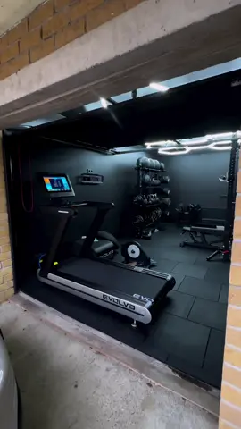 Transform Your Garage into a Premium Home Gym! 🏋️‍♂️🚗➡️💪 We’re thrilled to share our latest project—a fully equipped home gym in Vilnius! What was once a car garage is now a state-of-the-art workout space, designed for top-tier fitness and convenience. This gym features everything you need to achieve your fitness goals: 🔥 Evolve Treadmill Home Series with an 18.5” TFT Console: Track your progress with ease and stay entertained during your workouts with MP3 and USB compatibility. 💪 Functional Training Essentials: Evolve Carbon Series Powerbags Evolve Carbon Series Wall Balls Evolve Angled Glute Box 🎯 Strength Training Equipment: A full range of free weights, adjustable dumbbells, and kettlebells to target every muscle group. Evolve Ultra Series CPU Urethane Weight Plates (1.25–25 kg) for versatile lifting options. Prime Series Adjustable Bench for optimal support and flexibility. Wall-Mounted Power Rack System for safe and effective strength training. Whether it’s cardio, functional, or strength training, this home gym has it all! 🚀 Looking to create your own dream home gym? Let’s make it happen! Contact us for a consultation and top-quality gym equipment. #HomeGym #GarageTransformation #FitnessGoals #GymEquipment #evolvefitness