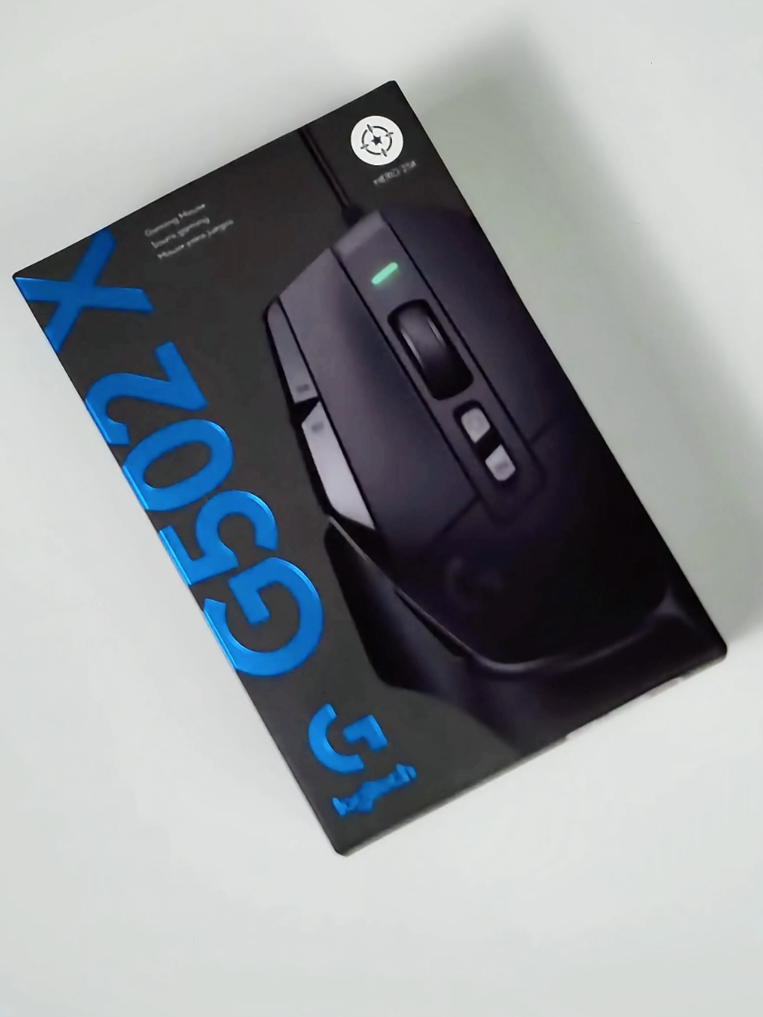 ASMR Unboxing the Logitech G502 X Gaming Mouse features LIGHTFORCE hybrid optical-mechanical switches, ensuring rapid response times with satisfying tactile feedback. Equipped with the HERO 25K sensor, it delivers exceptional precision with sensitivity settings reaching up to 25,600 DPI. Weighing only 89 grams, its lightweight exoskeleton design allows for swift and comfortable movements. The adjustable DPI-shift button is tailored to adapt to your grip, enabling on-the-fly sensitivity changes. Additionally, the dual-mode scroll wheel offers hyper-fast and ratcheted scrolling options, adding versatility for various gaming scenarios. For me, the lightweight design and highly responsive buttons provide a unique experience that may feel different depending on personal playstyle. While some may appreciate the agility and sensitivity, others might prefer a slightly heavier build or firmer button feedback. It’s all about what suits your individual gaming needs.  #g502 #pcgaming #gamingmouse #gamer #logitech #GamingSetup #mouse