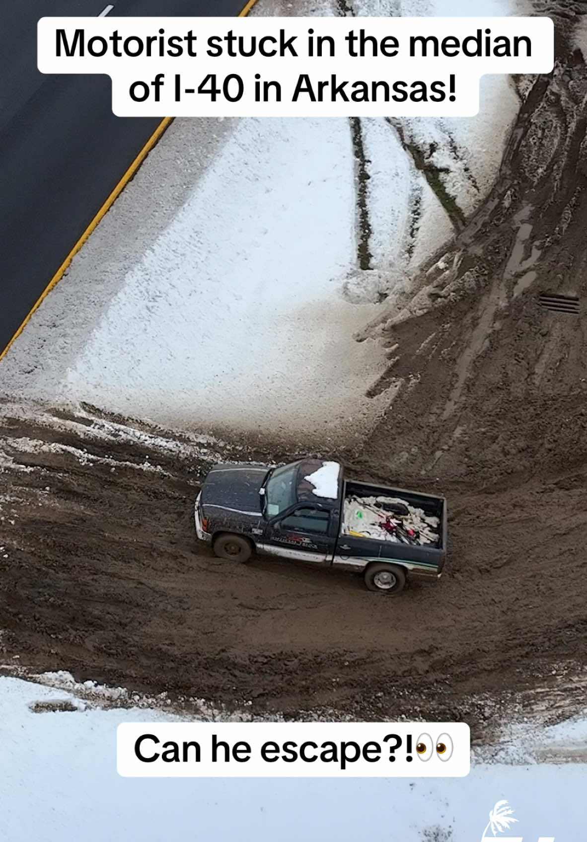 Motorist gets stuck in the median after sliding off I-40 during Winter Storm! Can he escape the mud hole?! #storm #winter #stranded #funny #truck #mud #weather #arkansas 