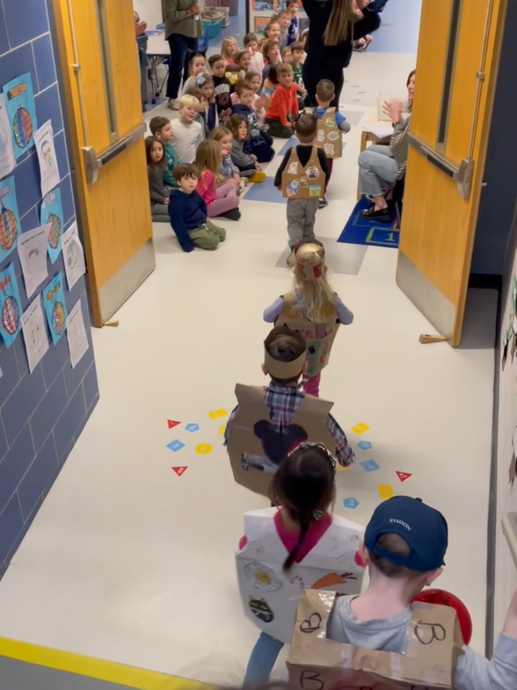 Who says #fashion is just for adults? Our #prek class walked the #catwalk to end our clothing study. Each child dressed up as one letter, decorating a paper bag with objects that begin with the sound that letter makes. What an awesome #crosscurricular #learning activity! #preschool #nj #newjersey #creativecurriculum #literacy #phonologicalawareness #phonemicawareness 