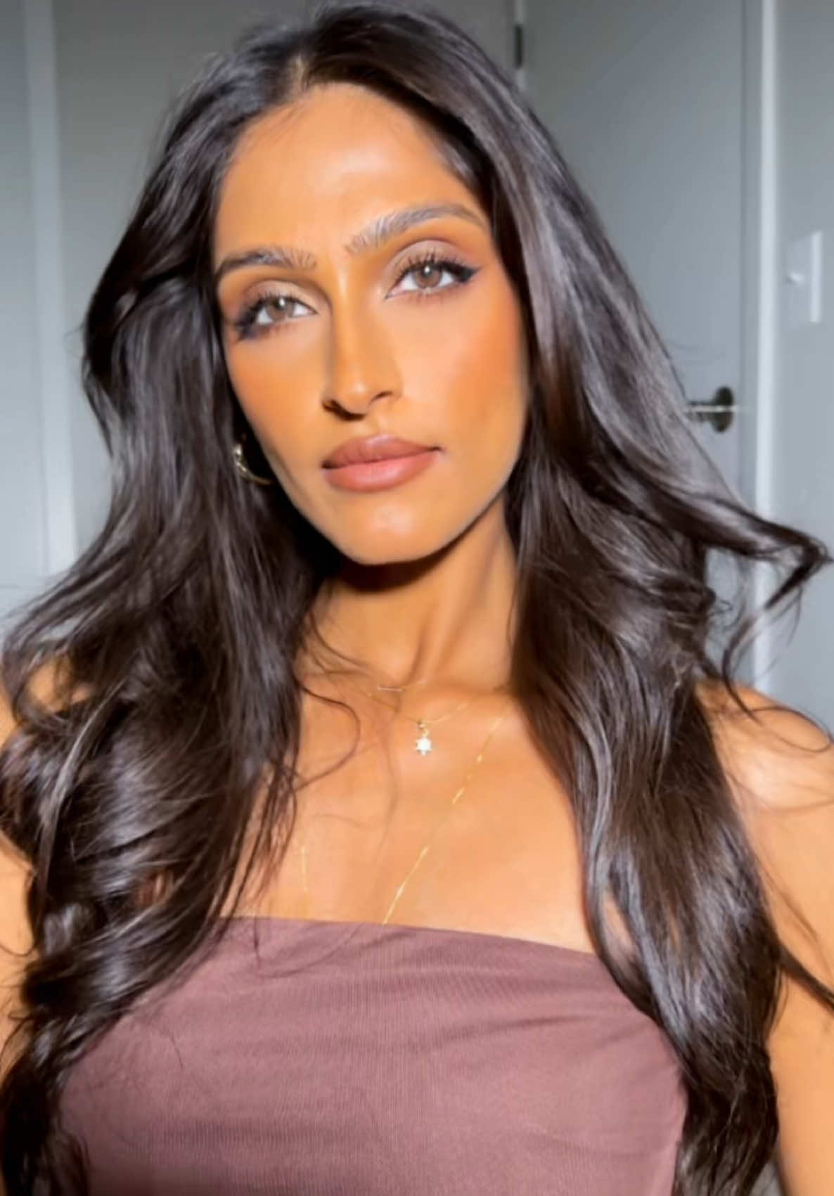 Rawr punch GLAM 💄  #creatorsearchinsights  #rawr #makeuplook #browngirlmakeup  #cateye #indianmakeup #makeup #unrecognizablemakeup #fyp  #makeup #transition #trending #baddiemakeup 