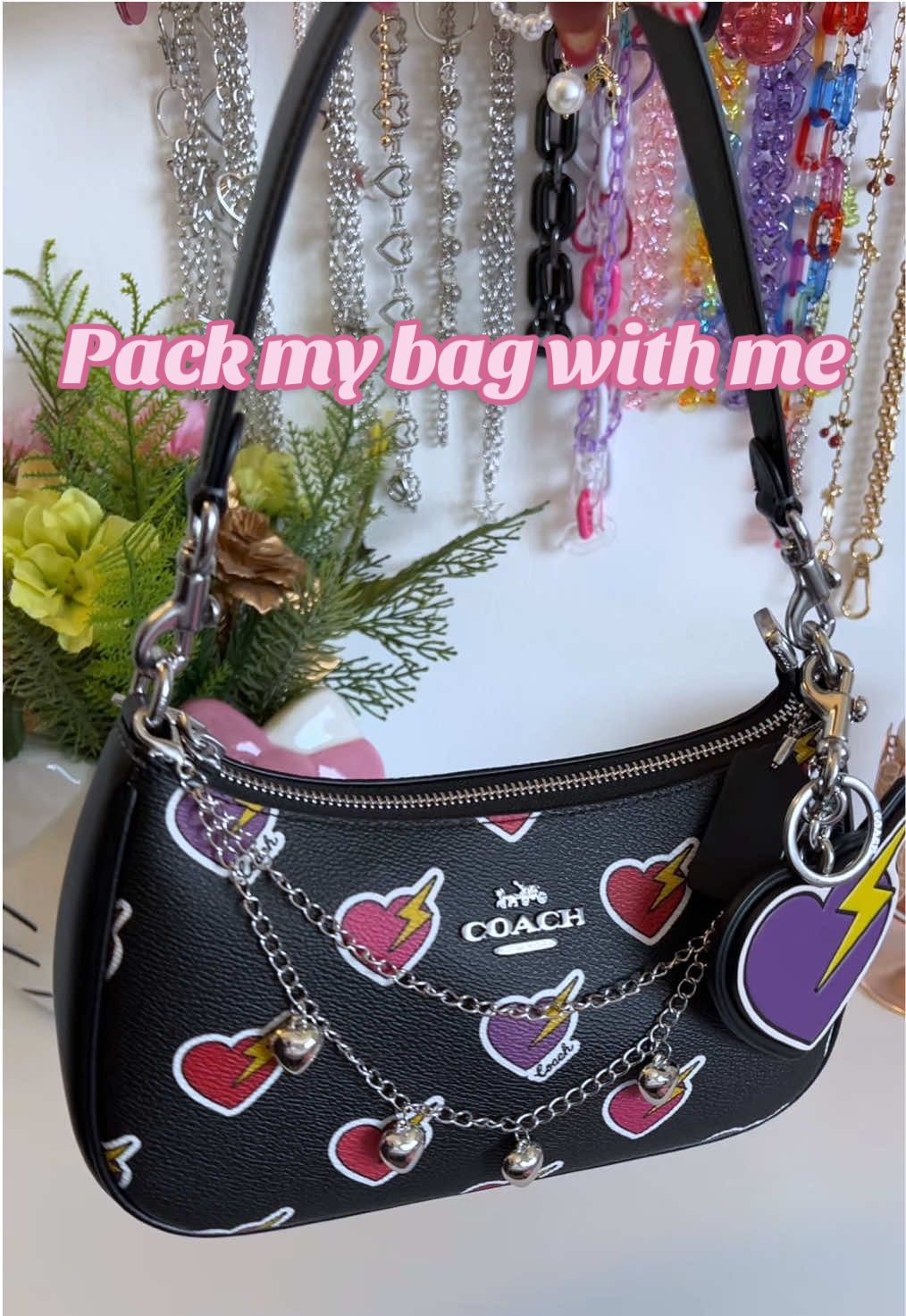 Pack my bag with me 🖤 this is the coach Teri shoulder bag with hearts and bolts ❤️ I honestly haven’t been in the biggest mood to upload a video with everything going on,so I’ll be uploading my drafts until the ban comes along, I really do appreciate all the friends I’ve made on here 💗  @Coach #teri #coachbag #coach #purse #bag #coachpurse #fyp #foryoupage #hearts #terishoulderbag #shoulderbag #essential #packmybag #packmybagwithme #packmypursewithme #bagcharm 