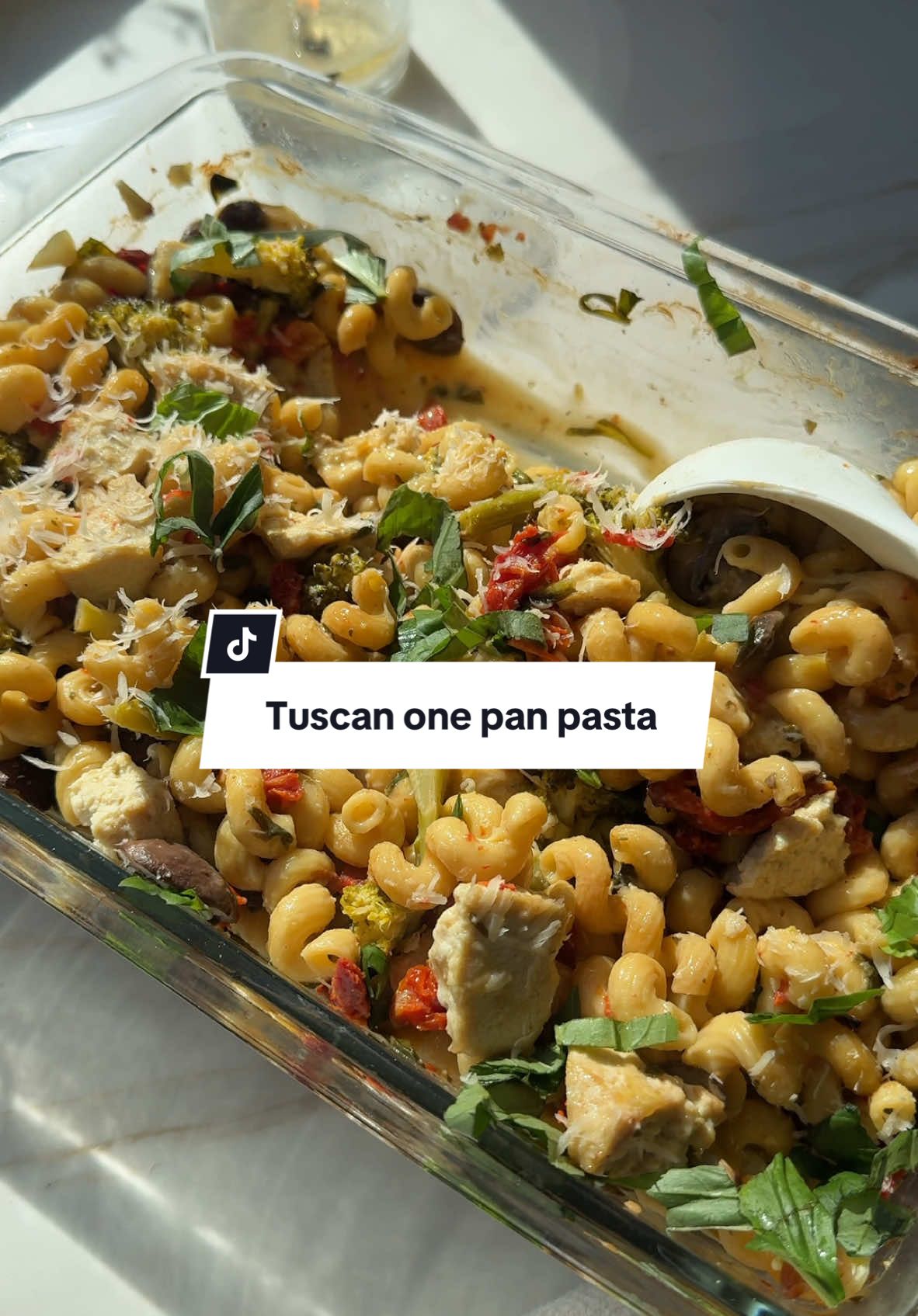 ONE PAN TUSCAN PASTA (healthy dinner idea!)🍝🌿 You need:  Sauce on the bottom:  2 tbsp olive oil 6 cloves minced garlic 3/4 cup full fat unsweetened coconut milk or coconut cream  1/4 cup nutritional yeast  1 tsp dried basil 1 tsp dried oregano 1 tsp salt  *add all of this to a pan and whisk  The rest:  8 oz small short pasta I use protein pasta  1.5 cups chopped broccoli  1/2 cup chopped sun-dried tomatoes  1 cup sliced baby Bella mushrooms 2 cups chopped spinach  4 cups water  *mix it all together well Bake covered for 20 minutes and uncovered for 20 minutes at 400 F.  Optional add protein when its done like sautéed tofu! Garnish with parmesan cheese I use vegan parm.    #dairyfree #MomsofTikTok #onepandinner #onepotmeals #vegan #plantbased 