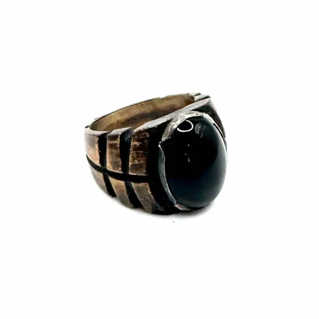 What’s a dark and mysterious book or movie you would recommend to others? Bharat Ring With Onyx in Bronze # #Rebel #Punkjewelry #GothicLuxury #Artisan #Pieces #Aesthetic #Gothicjewelry #Designs #Exclusive Buy here https://julianthe2nd.com/products/bharat-ring-with-onyx-in-bronze