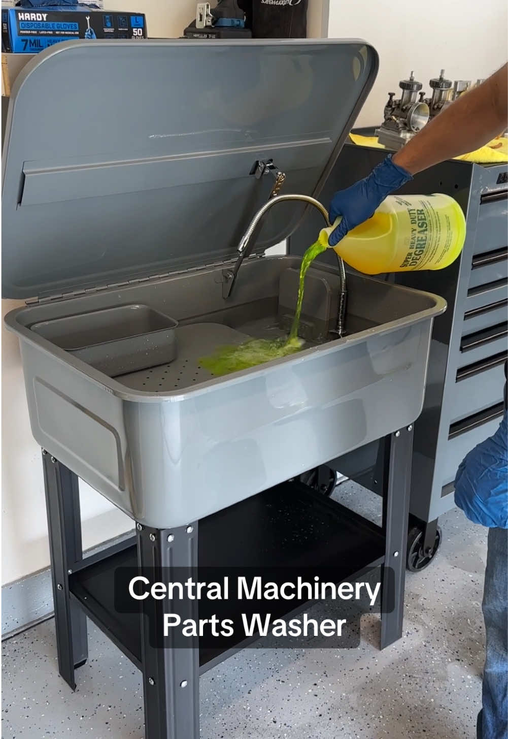 The Central Machinery 20 Gallon Parts Washer with High-Flow Pump features a flexible spigot that allows you to direct solvent flow over parts. Priced at only $139.99. #HarborFreight #PartsWasher