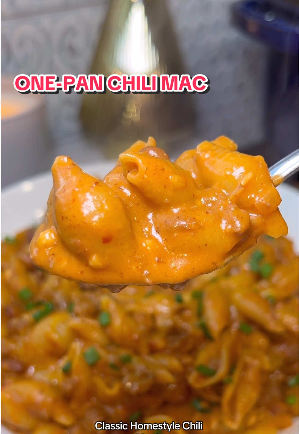 One-Pot Chili Mac 🫘❤️‍🔥 #BushsBeansPartner  For episode 30 of my one-pan meals series, I’m giving my viral cheesy beef and shells a twist with this incredibly delicious — and arguably even better — cheesy chili mac with @Bush’s Beans Classic Homestyle Chili Magic! Here’s how to make it: 1 tbsp olive oil 1 yellow onion, diced 1 tsp red pepper flakes (optional) Salt and pepper, to taste 4-6 cloves garlic, minced (to taste) 1 lb ground beef 2 (15 oz) can Bush's Beans Chili Magic Classic Homestyle 3 tbsp tomato paste 4 cups beef broth 1 cup cream 1 lb medium pasta shells 4 oz freshly shredded cheddar cheese Fresh chives for garnish (optional) 1. Heat olive oil in a large pot over medium heat. Add the diced onion and sauté with salt, pepper and red pepper (if using) until softened, about 5 minutes. 2. Create a space in the center of the pan. If needed, add a bit more olive oil, then add the ground beef. Let it sear and develop a golden crust before flipping, then season with salt and pepper. Break apart with a spoon and cook until browned and fully cooked through. Drain any excess fat if desired. 3. Create a space in the pan and add the tomato paste. Let it sit undisturbed for a couple of minutes to caramelize, then stir and cook for an additional 2 minutes to deepen the flavor. 4. Pour in the Chili Magic and beef broth. Bring to a simmer. 5. Add the pasta shells to the pot and stir to combine. Let the mixture simmer, stirring occasionally, until the pasta is cooked al dente, about 10-12 minutes. If the mixture becomes too thick, add a little more beef broth to reach your desired consistency. 6. Once the pasta is cooked, turn off the heat. Stir in the cream and shredded cheddar cheese, mixing until the cheese is melted and the dish becomes creamy. 7. Serve immediately, garnished with fresh chives (if using) and enjoy!   #onepan #onepanmeal #onepot #onepotmeals #chilimac #EasyRecipe #EasyRecipes #FoodTok #cooking #easymeal #dinner #DinnerIdeas #easydinner #chili 