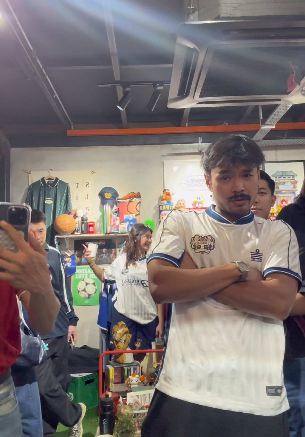 tf this liverpool guy standing next to me for jonnies bodega latest jersey collection, secure yours at Gaskey Alley