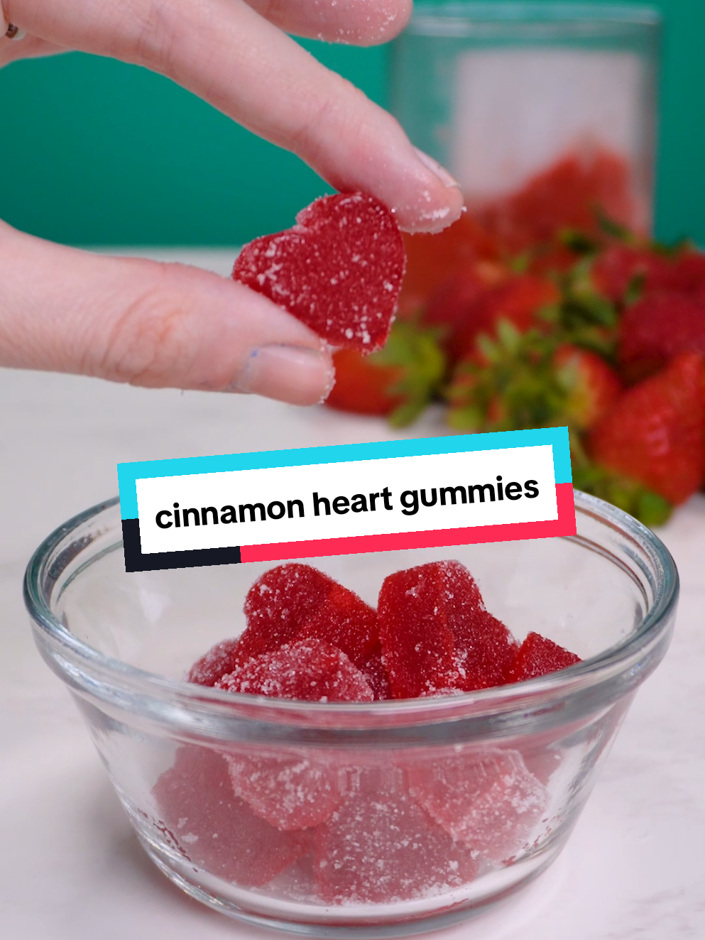 I tried making cinnamon heart gummies 😋❤️ ✨Recipe: Ingredients: • cinnamon hearts (1/4 cups) • 1 cup boiling water • cherry jello • 1 packet of gelatin • ¼ cup cold water (for blooming gelatin) • White sugar (for coating) Directions: 1. In a medium saucepan, boil 1 cup of water. Add the cinnamon hearts and stir until they are completely dissolved. 2. Pour the hot cinnamon mixture over the cherry Jello powder in a heatproof bowl. Stir until the Jello is fully dissolved and set aside. 3. In a separate small bowl, bloom the unflavored gelatin by sprinkling it over ¼ cup of cold water. Let it sit for 5 minutes until it absorbs the water and becomes gelatinous. 4. Add the bloomed gelatin to the warm Jello mixture and stir until fully combined and smooth. 5. Carefully pour or pipe the mixture into silicone molds. Refrigerate for at least 6 hours, or until the gummies are fully set. 6. Once set, transfer the gummies to the freezer and freeze until firm. Remove the gummies from the molds and let them sit at room temperature to dry out slightly. 7. Roll the gummies in white sugar to coat them evenly. 8. Serve and enjoy these sweet, spicy, and chewy treats!