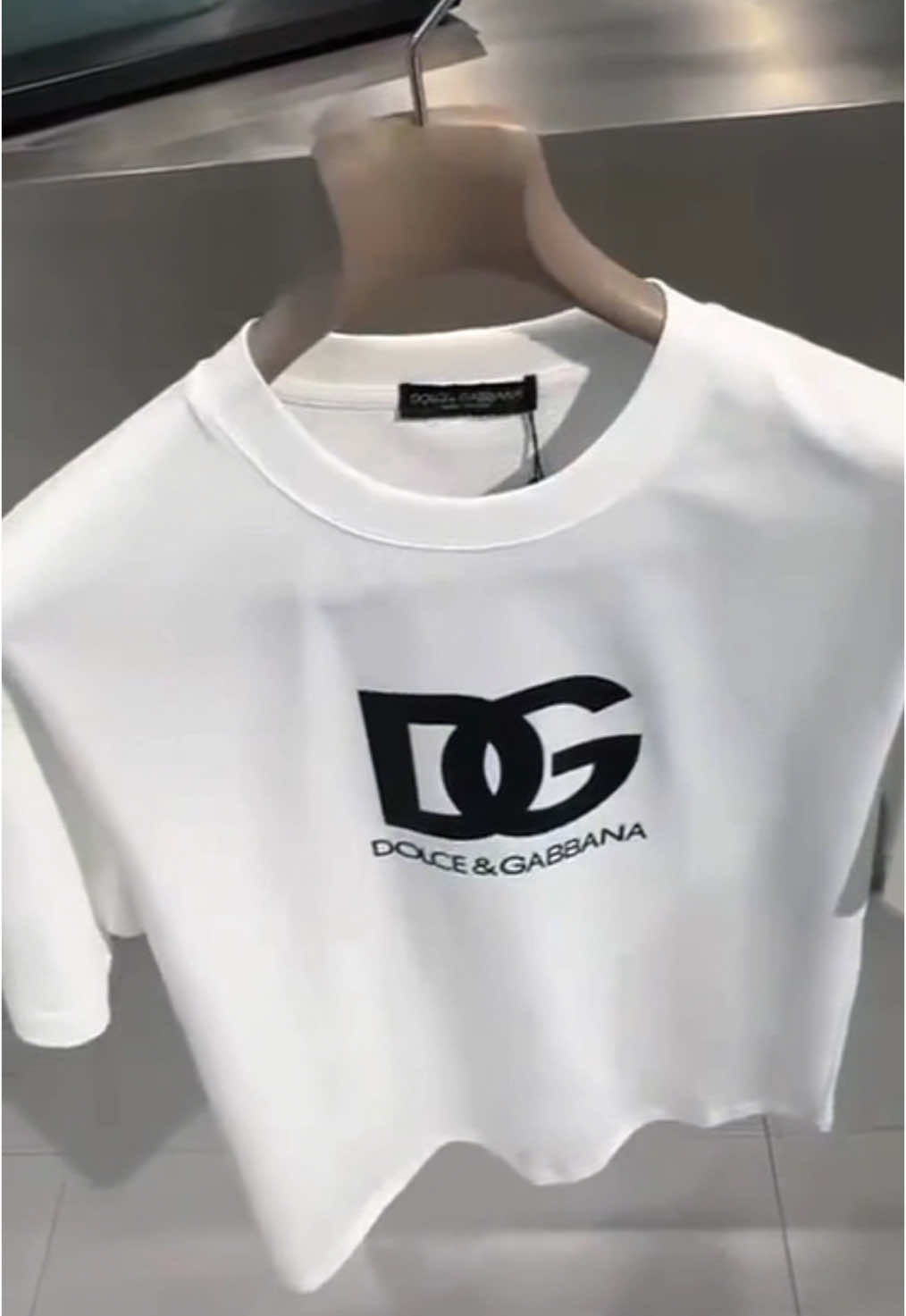 Step into luxury with the iconic DG Milano tee. 🤍 Timeless, versatile, and effortlessly chic – this is a wardrobe essential for the modern trendsetter. Tap the link in our bio to shop now!✨ #DolceAndGabbana #DGMilano #LuxuryStyle #DolceAndGabbana #LuxuryMenswear #StyleIcon #TimelessFashion #WhiteTeeStyle #MensWardrobe #FashionGoals #DesignerWear #MensLuxury #OOTD #CapCut 