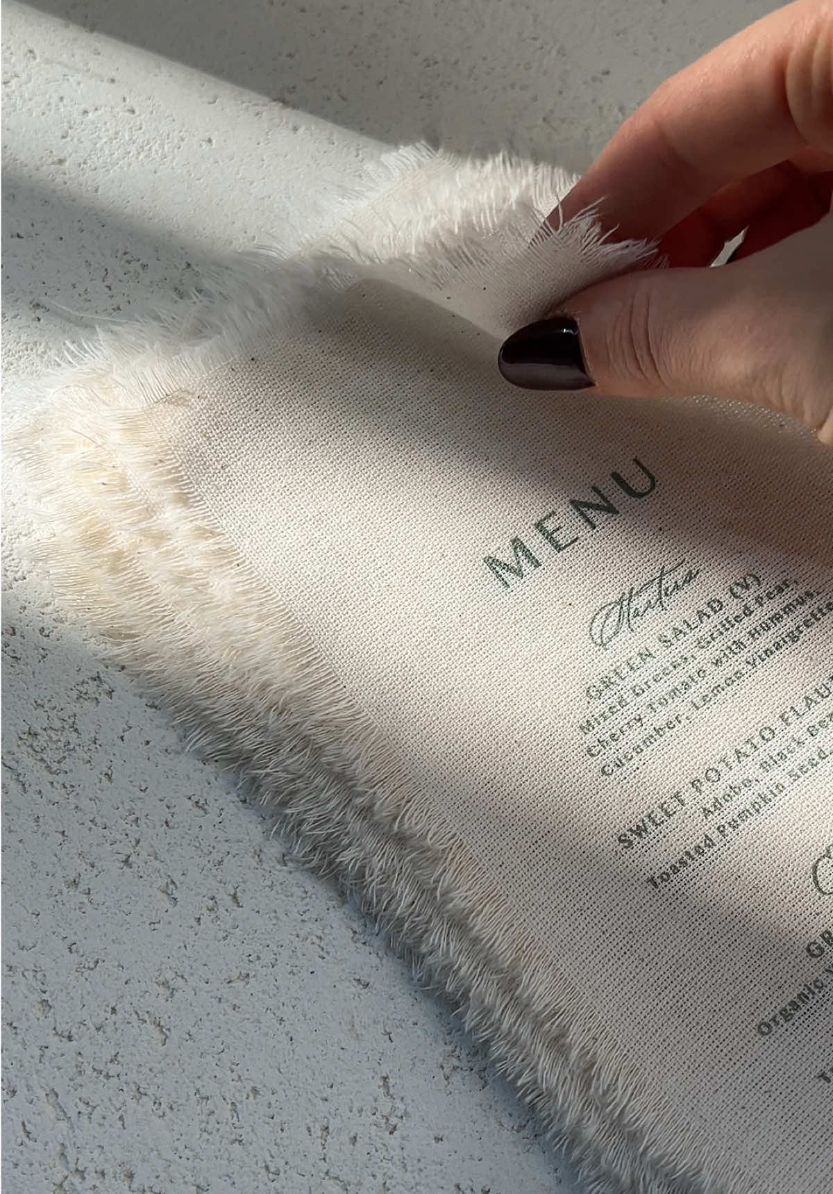 Letterpress fabric menus with custom wax seals. Memorable and personal tactile details for special celebrations! #papiradesign #luxurystationery #letterpressprinting #weddingday #weddingtrends #weddinginvitation #luxuryevents #letterpressinvitation #waxseal #customwaxseal #fabricmenus 