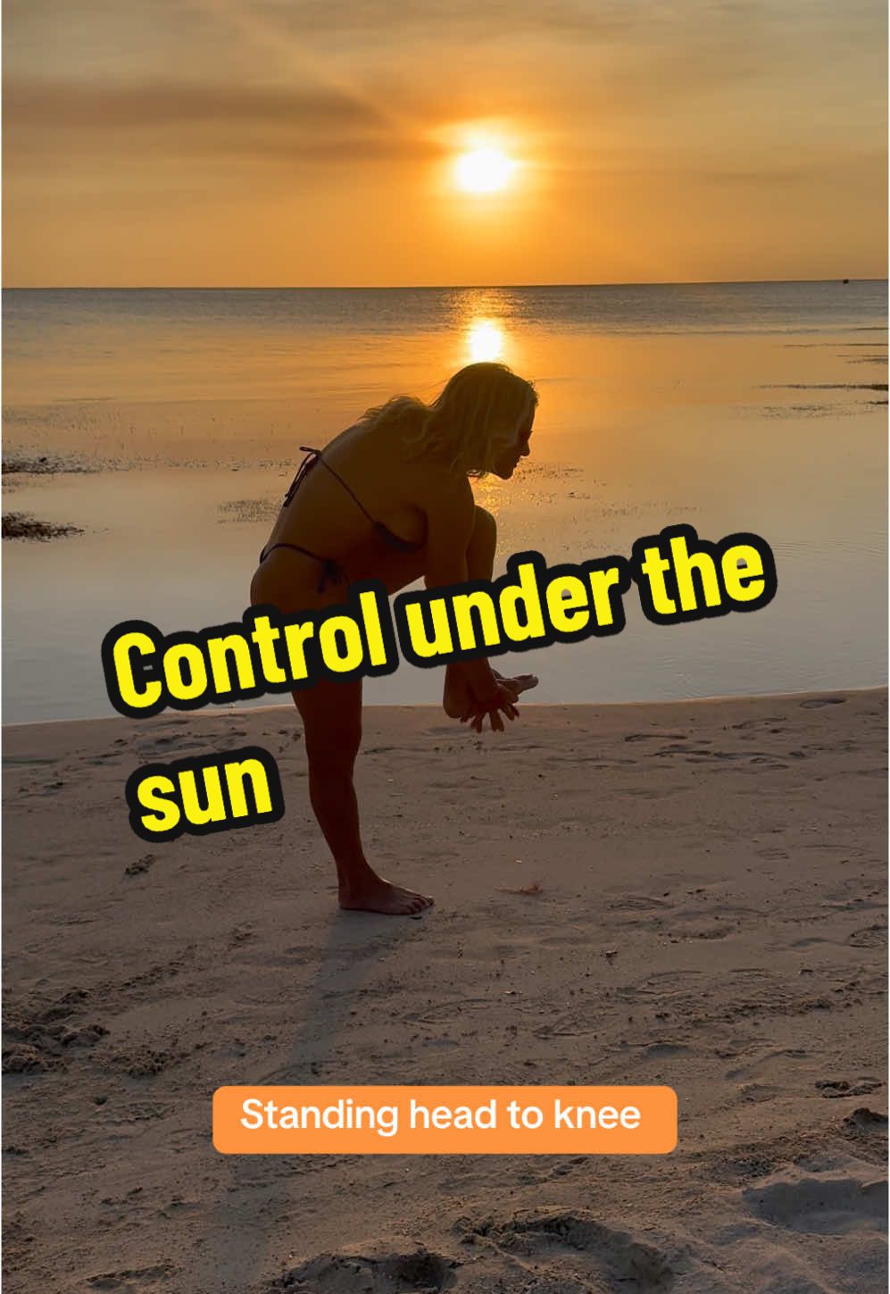 Standing head to knee pose under a perfect sunset.  #SunsetYogaPose #StandingHeadToKnee #BeachBalance #GoldenHourGlow #YogaByTheSea #StrengthAndFocus #SereneSunsets #OceanZen #MindfulMovement #YogaJourney #PeacefulPractice #BeachsideYoga #NatureAndGrace #YogaGoals #GoldenHourYoga #fyp 