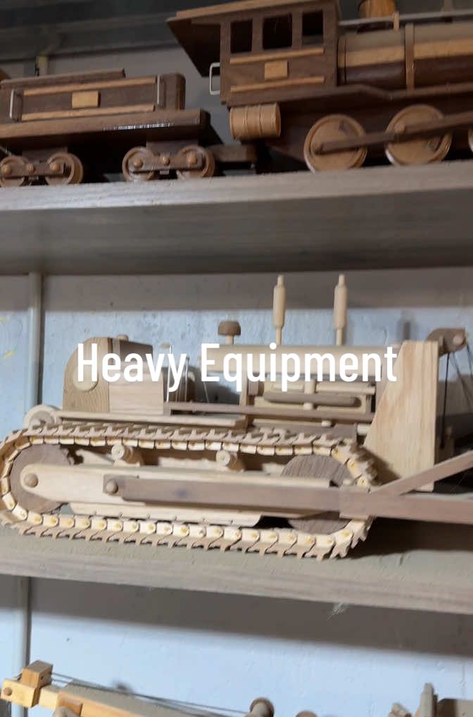 Let’s look at some wooden models created by my nephew out of sawmill scraps from back home on the farm. #model #wood #projects #cat #truck #loboy #crawler #backhoe #excavator #farmall #tractor