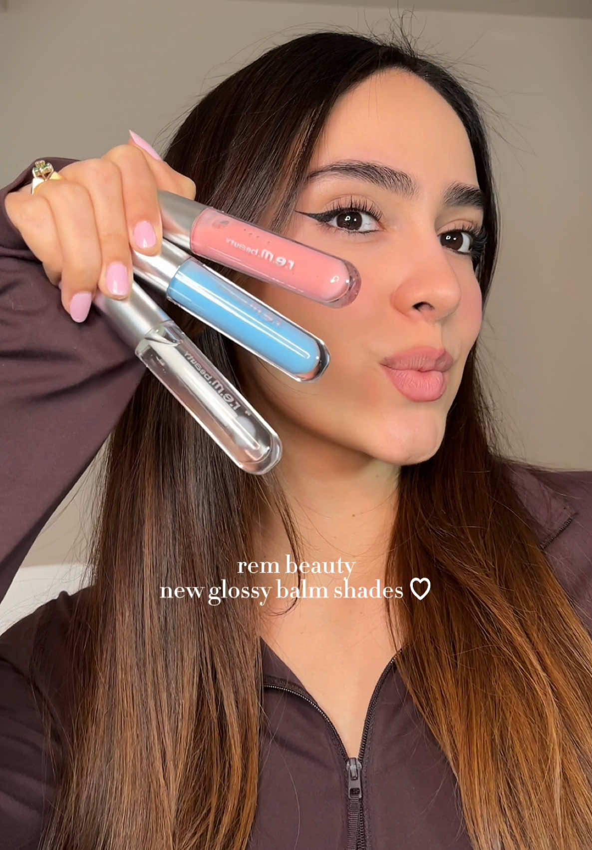 new glossy balm shades @r.e.m. beauty 🤍 💗 cosmo  🧊 cotton candy  🫧 on ice @arianagrande #rembeauty #remflightcrew #glossybalm #newmakeup #lipswatch #gloss #makeuptryon #arianagrande 
