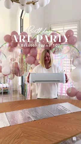 Crafting magic with my @Cricut Maker 3 and heat press for my Bristol’s 10th ‘PainTEN’ birthday party was a dream come true! 🎨 🎂✨ #ad From personalized apron party favors to the cake topper every detail was lovingly handmade to make her day extra special. The Cricut's precision and versatility allowed me to bring the theme to life, while the heat press added that perfect professional touch. 🌟 You can find the links to the Cricut products I used in my LTK, link in bio. #cricutmade #Cricut #DIYPartyDecor #BirthdayMagic #HandmadeWithLove #birthdayparty #birthdaygirl #CreativeCelebrations #CraftingJoy
