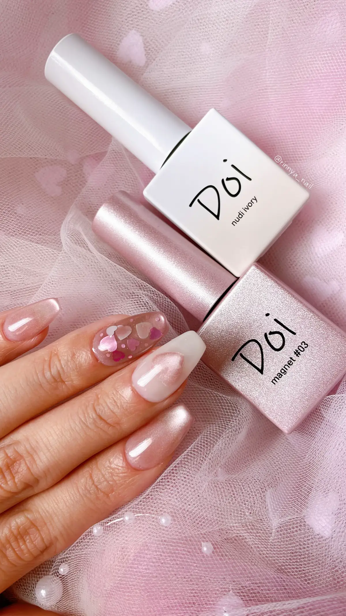PR♡ @Nailbayo.jp  𓂃 ℳ𝒶𝑔𝓃ℯ𝓉 ♡ 𝟶𝟹 𝓅𝒾𝓃𝓀　𓂃  ぷるぷるガーリー𝚗𝚊𝚒𝚕💅🏻🎀 このマグ、ぷるぷるなるよぉ！！✨ ୨୧ ┈ ┈ ┈ ┈ ┈ ┈ ┈ ┈ ┈ ┈ ┈ ┈ ┈ ୨୧ ￤ᝰ✍︎꙳⋆ 全てにmagnet#03 使用。 マグネットワンカラーは一度塗り、 ハートホロ埋め込みのところは2度塗りにしてます。 濃淡でカラーバランスとれるよ🫶🏻 アイボリーは2度塗りですっ マグネットピンク🩷、 かわいすぎるよね🤦🏻‍♀️💓💓 このピンクは明るいピンクってよりも くすみ感のあるピンクで色気あるカラー🤦🏻‍♀️💓🫶🏻 私は𝐷𝑜𝑖𝑔𝑒𝑙 magnetは 2度塗りよりも1度塗りで仕上げる このシアー感とプルプル感が大好きっ🫧🩷 マグネット🧲動かしてるときの きらっと輝き、ぷるっとする瞬間が好きすぎる🤦🏻‍♀️💓 ୨୧ ┈ ┈ ┈ ┈ ┈ ┈ ┈ ┈ ┈ ┈ ┈ ┈ ┈ ୨୧ ⋆ ⋆ 📢📢📢𓂃𓈒✩⋆⁺₊˚ 韓国ジェル“ 𝙣𝙖𝙞𝙡𝙗𝙖𝙮𝙤 ” HEMA FREE & VEGAN Brand🌿💅🏻🫶🏻 日本上陸🇯🇵し、Qoo10で発売中です𓂃🛒 🔗⌇https://m.qoo10.jp/shop/nailbayo ▶︎𝙲𝚑𝚎𝚌𝚔👀 Instagram 🩷🇯🇵⌇ @nailbayo_official.jp  🩷🇰🇷⌇ @nailbayo  ⋆ ⋆ ୨୧ ┈ ┈ ┈ ┈ ┈ ┈ ┈ ┈ ┈ ┈ ┈ ┈ ┈ ୨୧ 𓊆ㅤ✎*𝑎𝑛𝑑♲𝑎𝑛𝑑♡⸝⸝ 𝒕𝒉𝒂𝒏𝒌 𝒚𝒐𝒖 ❥  𓊇  勝手にシェアなんかも大歓迎です·͜· 🫶🏻 さまざまなアクションが励みになります💖 いつもありがとう〜🙌🏻🤍 ネイル好きな方是非仲良くしてね🙌🏻🎀 💅🏻🎀⌇ @rinnya_nail  ネイルバヨかわいいでしょ〜💖🫶🏻☺️ 今、新しいジェルのプレゼントキャンペーンやってるから ネイリストさんはもちろん、セルフネイラーさんもチェックチェック〜‼︎🎀 ▸▸▸ @nailbayo_official.jp  ⋆ ⋆ #トレンドネイル #ハートネイル #ハートホロネイル #バレンタインネイル #透け感ネイル #ガーリーネイル #ピンクネイル #pinknail #𝙿𝚁 #nailbayo  #네일바요　#nailbayoアンバサダー  #ジェルネイル #韓国ネイル #シンプルネイルデザイン #ワンカラーネイル #네일재료 #美甲 #美甲設計 #naildesign #rinnyanail #ネイルバヨ公式アンバサダー #ネイルバヨ公式アンバサダー1期