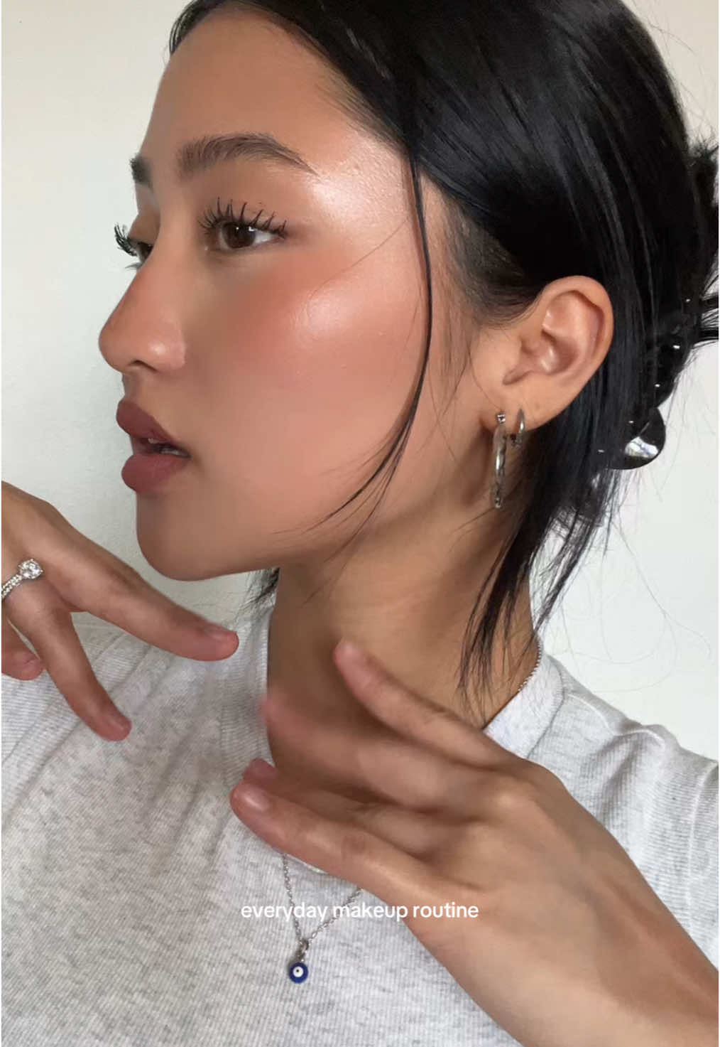 updated makeup routine 💘 let’s pretend we don’t see the mascara on my eyelids 🙈 products used: - the saem triple pot concealer (02) - essence baby got bronze (cinnamon spice) - milk lip + cheek cream blush stick (enigma) - d’alba first spray serum - elf primer infused blush (always rosy) - rare beauty highlight (exhilarate) - nyx highlight and contour palette - huda beauty easy bake loose setting powder (peach pie) - loreal telescopic lift waterproof mascara  - nyx lip liner (espresso) - maybelline ultimatte slim lipstick (more stone) #makeup #MakeupRoutine #grwm #fyp 