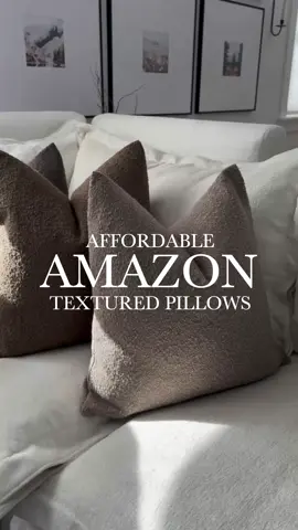 $11 boucle pillow covers 🔗 linked in bio!  I absolutely love these gorgeous boucle-textured pillow covers! The quality is outstanding, and the price is unbeatable for a set of two. I paired them with the best down pillow inserts that hold their shape perfectly. There are so many beautiful color options to choose from—I went with light taupe, brown, and dark coffee. 👉🏼 PRO TIP: Size up one size on the inserts, linked here too!  #amazonhome #budgetfriendlyhomedecor #cushioncover #bougieonabudget #affordablehomedecor 