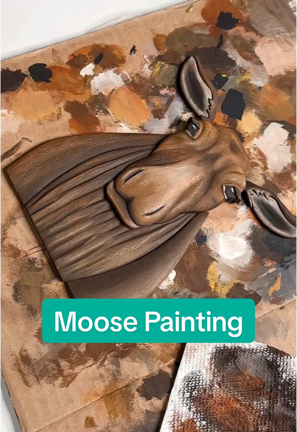 Hand painting the moose. I’ve got this guy just about finished up! Finished piece coming soon. #handpainted #woodart #handcrafted #woodworkingart #signmaker #woodensigns #woodworkingartist #woodpainting #creatorsearchinsights 