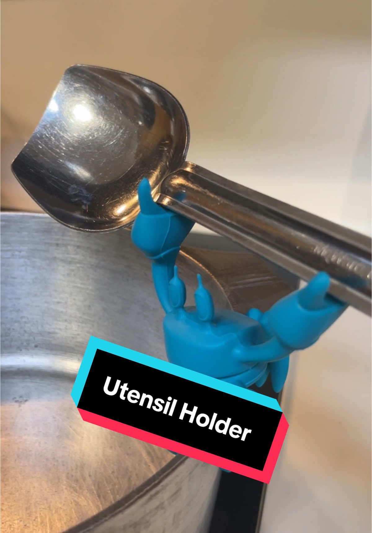 This utensil holder hooks on the side of your pot to hold your spoons when cooking. It also works as a steam release. This is made from silicone and is heat resistant. It is a cool gadget to have in the kitchen. #kitchengadgets #kitchengadget #cookingtiktok #cookinggadgets #spoonholder #kitchenaccessories #tiktokshopfinds #cooking #KitchenHacks 