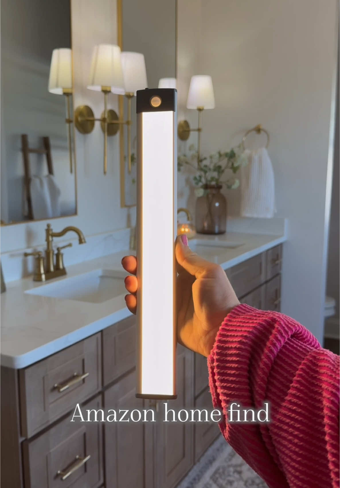 Amazon home find! These bar lights are peel and stick, rechargeable, and have motion detection! I added mine to the bottom edge of my cabinets and they add such a cozy feel to the room in the evenings!❤️ They also have magnetics so they can be easily removed for charging!!❤️❤️  #bathroomfinds #bathroominspo #amazonbathroomfinds #bathroom #bathroomdecor #bathroominspiration #amazonhome #amazonmusthave #bathroommusthaves #amazonhomefind 