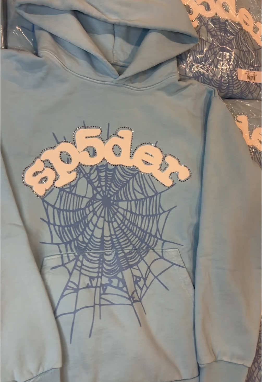 Sp5der Baby Blue Rhinestone Hoodie / $150 / singles & bulk available / instagram @theexoticvault_ #foryou #fy #fyp #foryoupage #explore #sp5der #babyblue #sp5derworldwide #streetwear #babybluehoodie 