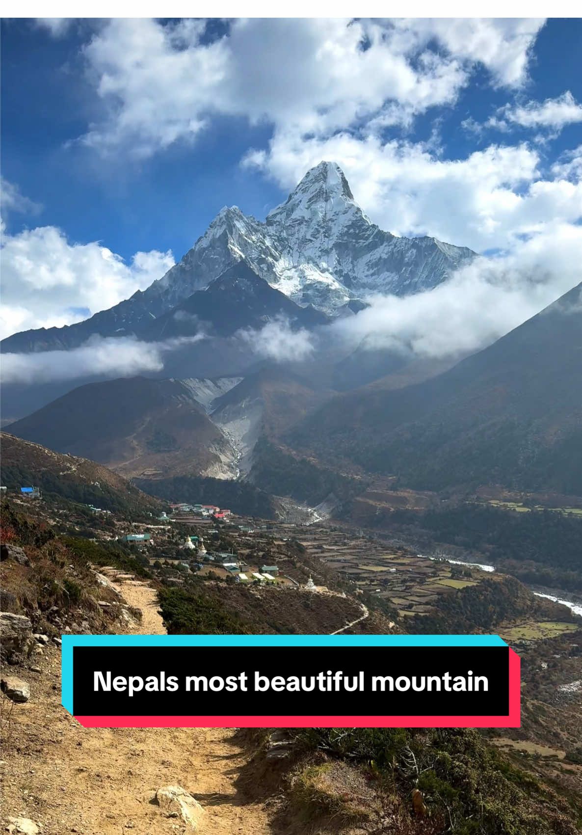 On the Trail to Mt. Everest Base Camp. This is not the typical route so this view is rarely seen. I was originally supposed to go to the Gokyo lakes first but weather created a detour to go directly to the mountain. Here in the video you see an empty trail and Ama Dablam, which is commonly dubbed as Nepals most beautiful mountain. #everest #nepal #Hiking #trek #nature #fyp #viral #foryoupage #traveltiktok #travel #adventure #trend #travellife #mountain 