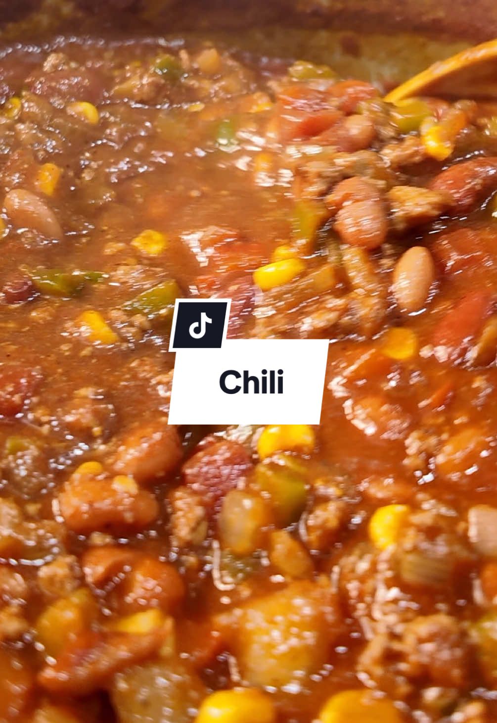 Replying to @Gabby sounded too good to pass up! #chilicookoff #easychili #chefleh #easydinner #mealprep  1 large onion, diced 1 green bell pepper, chopped 1 small red bell pepper, chopped 2 jalapeno peppers, diced (optional) 4 cloves garlic, minced 2 tablespoons cumin 1 tablespoon sugar  2 tablespoons chili powder 1/2 teaspoon ground thyme 2 cups beef broth 1 (15 ounce) can pinto beans, rinsed and drained 1 (15 ounce) can red beans, drained and rinsed 1 (15 ounce) can diced tomatoes, undrained 1 (15 ounce) can tomato sauce 1 Can corn - drained 1 (6 ounce) can tomato paste Heat olive oil in a large skillet over medium-high heat and stir in the ground turkey. Cook and stir until the turkey is crumbly, evenly browned, and no longer pink. Drain and discard any excess grease. Stir in the onion, green and red bell peppers, and jalapeno peppers. Cook and stir until the onion is softened and translucent, about 8 minutes. Add the garlic, cumin, chili powder, sugar, salt, black pepper, and thyme. Continue to cook until fragrant, about 8 more minutes, stirring occasionally. Stir in the beef broth, pinto beans, red beans, corn, diced tomatoes, tomato sauce, and tomato paste. Bring to a boil, then reduce heat to low. Simmer until thickened, about 45 minutes, stirring occasionally. For a thinner chill, cover the pot when simmering.
