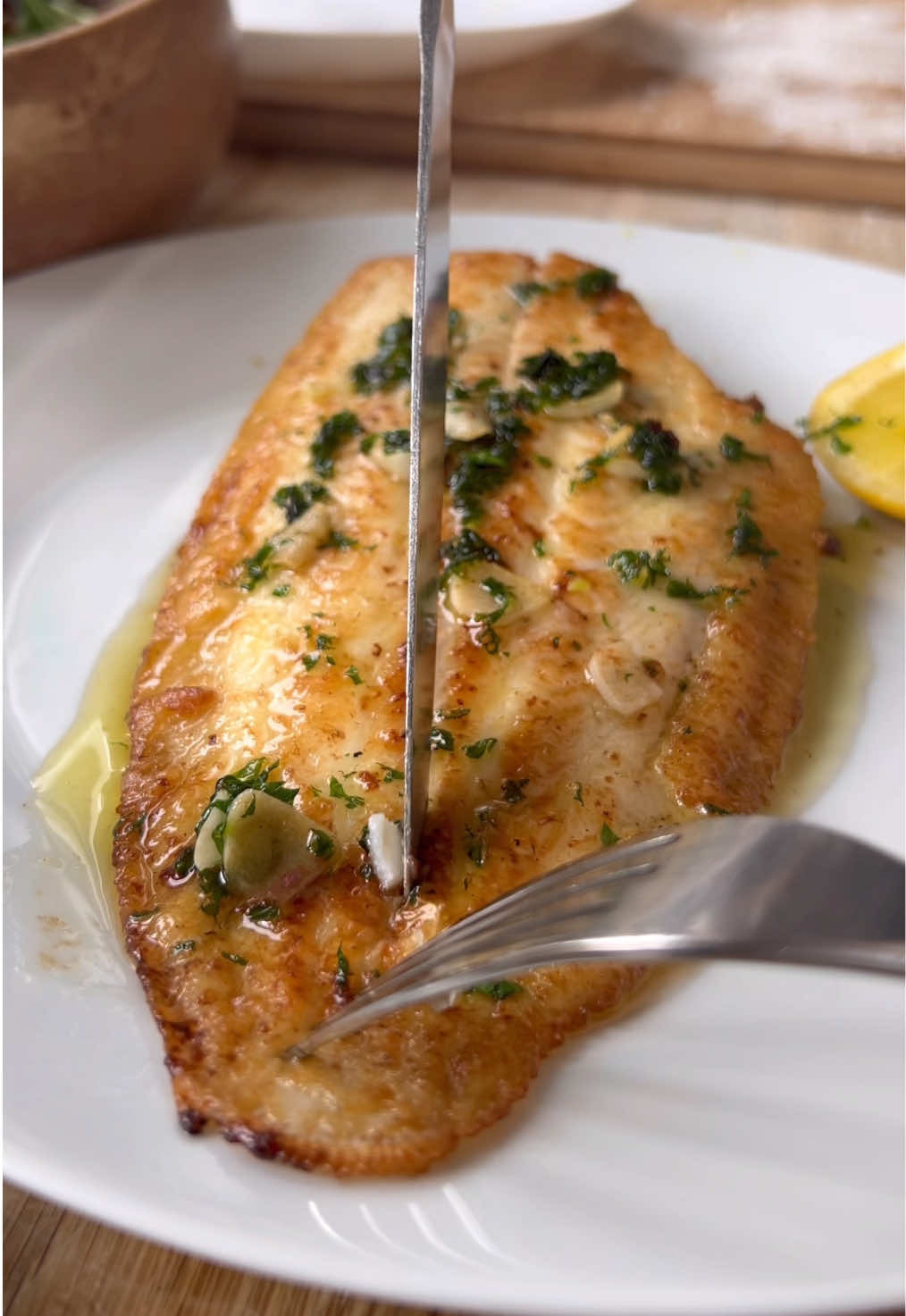 Sole Meunière. A 15 minute dish, perfect for a date night. Pan fried Dover sole in garlic buttery goodness. How could it not be delicious?  #comfortfood #homecooking #Recipe #ValentinesDay #valentinesrecipe #datenightdishes #seafood #doversole #frenchrecipe #romantic 
