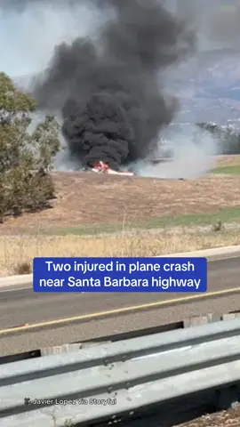 Two people were seriously injured after a small airplane crashed next to a highway in Santa Barbara, California. The victims, a male and a female, sustained “major injuries” and were transported to a nearby Hospital. By the time fire crews arrived, flames had already engulfed the aircraft and spread to surrounding area. 🎥 Javier Lopez via Storyful #california #la #crash #plane #news #fire 