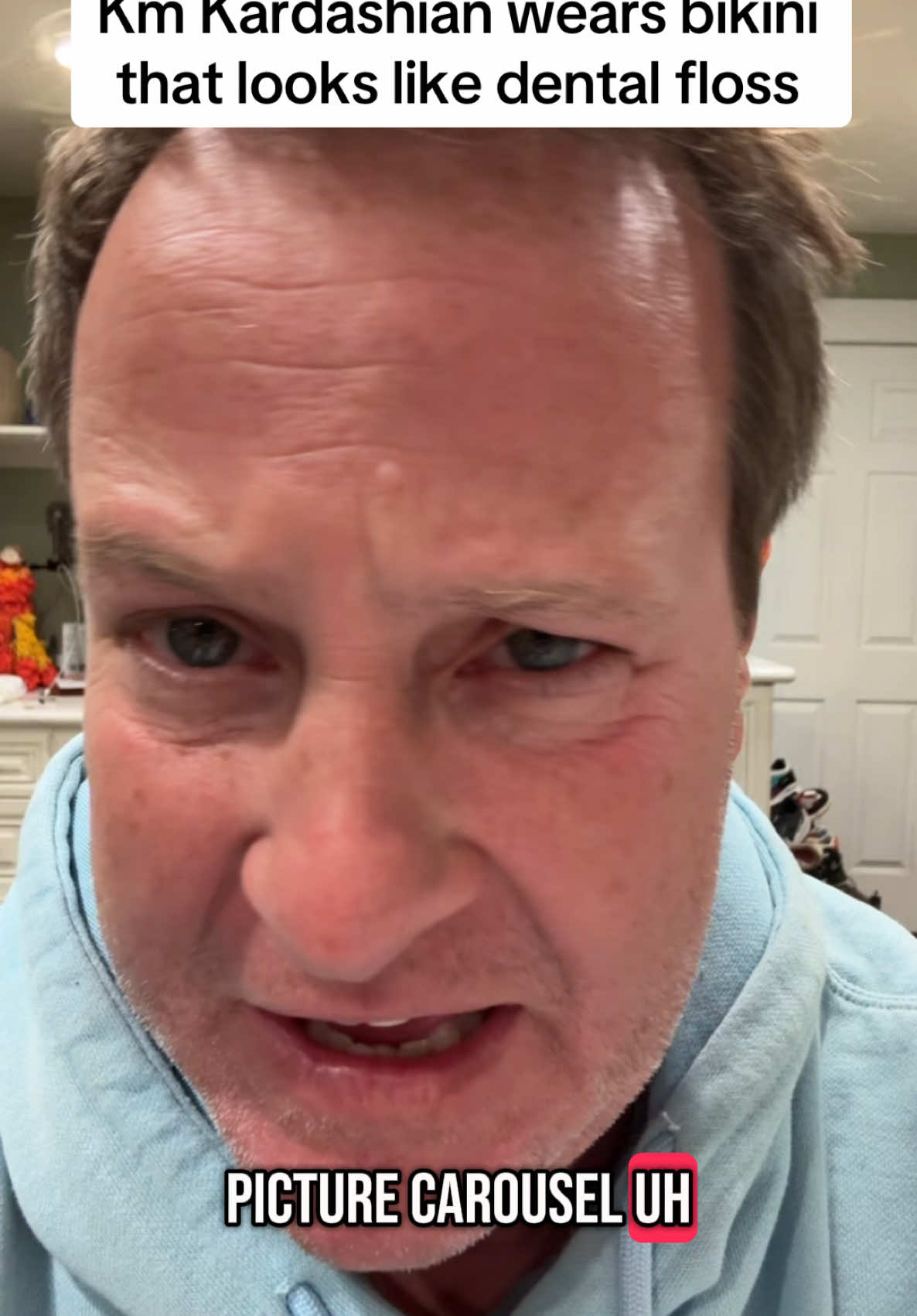 Km Kardashian wears bikini that looks like dental floss. 