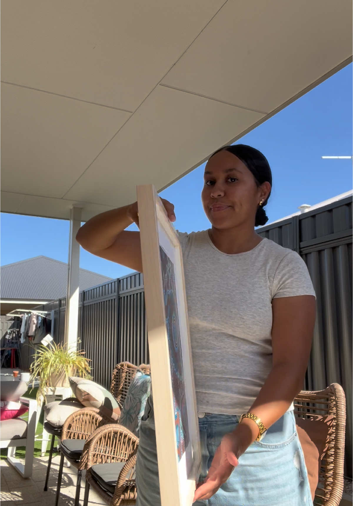 NAIDOC 2025 Artwork - The Next Generation: Strength, Vision & Legacy 👣🌿☀️🏡🖼️                      The painting represents the younger generation of Aboriginal People leading the way, empowering us, creating a strong, bright future and carrying on the legacy held before them by our Elders. It also represents the importance of connection between Family, Country and Culture #aboriginalart #artist #contemporaryart #fyp #aboriginal #NAIDOC #art #framedart #westernaustralia 
