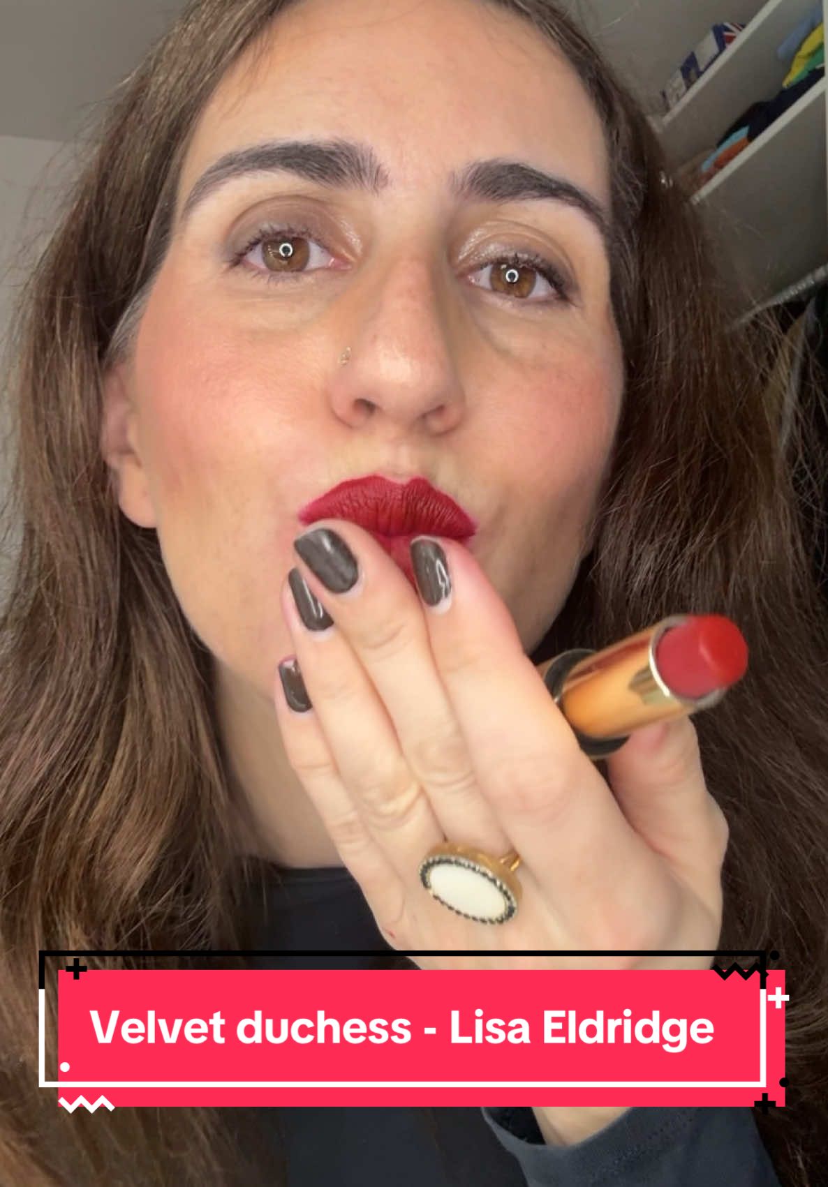 💄💋My beauty Queens!  Here it is Lisa Eldridge’s Velvet Duchess Lipstick 💄  rich ruby red with cool undertones and a matte finish.  Positive: 	•	Highly pigmented for bold, opaque coverage. 	•	Velvety smooth for comfort. 	•	Long-lasting leaving a subtle stain. Not so positive: 	•	Slightly drying over long periods of time. Velvet Duchess draws inspiration from classic deep reds, radiating timeless elegance.  With cool undertones, it beautifully complements similar skin tones, adding depth and sophistication to any look. Featured in the iconic series The Crown, from Netflix, for Imelda Staunton while portraying Queen Elizabeth II, this shade perfectly captured the regal essence of royalty.  Nichola Coughlan also has used this lipstick in Bridgerton. Since its 2019 launch, Velvet Duchess has become a cult favorite, loved for its luxurious formula and captivating color. A must-have red for effortlessly elevating any makeup look. #LisaEldridge #VelvetDuchess #LuxuryLipstick #vintagestyle@Lisa Eldridge 