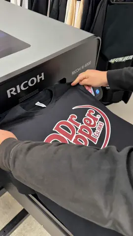 T-shirt printing made even easier with the RICOH Ri 4000! ✅ Save time and money with built-in pretreatment  ✅ Print on both polyester & cotton #dtg #dtfprinting #tshirtprinting #printondemand 