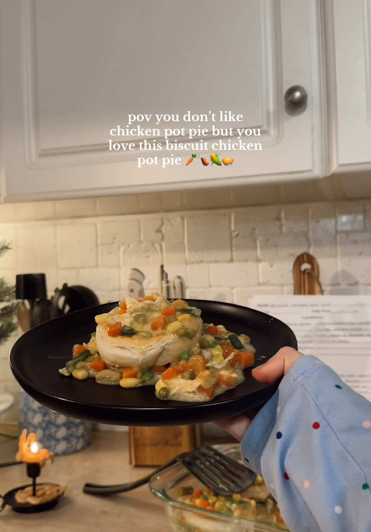 Biscuit Chicken Pot Pie 🤍 Recipe below 🫶🏼 My husbands comfort meal and always a crowd pleaser!! Ps. This was last night because we are eating take out tonight 🤭 Balance 🤌🏼 Ingredients: ✨ 1 can of pilsbury grand biscuits ✨ 2 Chicken breast- cook + shredded   ✨ 1 to 2 cups chicken broth ✨ 1 tablespoon of butter ✨ 1 can cream of chicken Soup ✨ 1 small bag of frozen mixed veggies- carrots, peas, corn, green beans ✨ salt and pepper to taste Instructions:  Preneat oven to 400. In a large sauce pan heat butter and add veggies + sauté until tender, 5-7 min. Season with salt and pepper. Whisk in the broth + cream of Chicken soup. Let the sauce simmer for about 1 minute until thickened. Season w/ more salt and pepper if desired. Turn off heat and add cooked shredded chicken to the mixture, Stirring until  filling is well combined. It the filling is too thick, stir in Extra broth. On a parchment paper lined sheet pan bake biscuits for half the time said on can. Take them out of oven. Pour filling into a buter 13x9 baking dish. Top the tilling w/ the biscuits flipping them over from top to bottom to insure even baking on each side. Bake for 10 mins - until biscuits are golden brown and filling is bubbly. #recipes #recipesoftiktok #chickenpotpie #cooking #tiktokmeals #Dinnerldeas #fyp #creatorsearchinsights 