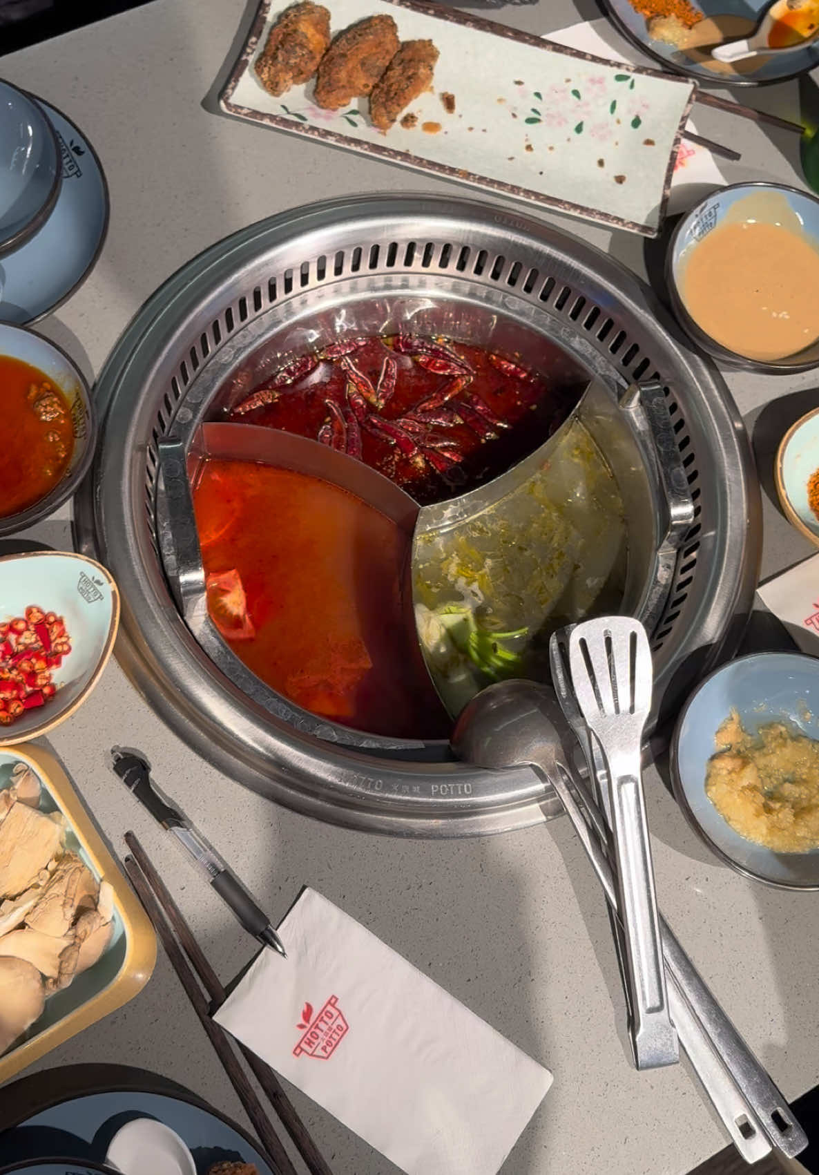 Had an amazing time trying HALAL hotpot in London at @Hotto Potto  ✨ Highlights: ✔️ Halal options are clearly marked on the menu—just ask! ✔️ Rich tomato broth (my top pick!) and Very spicy broth (a bit salty, but nice flavour) ✔️ They even have a karaoke lounge downstairs—perfect for a fun night out! 🎤 🥩 What I ordered: Beef & lamb platter Sichuan spicy beef Frog Leg Egg fried rice Pak choi Satay dipping sauce 🥤 Drinks: Mild Alcoholic Drinks Virgin mojito Regular Coke I would definitely recommend to try is if you are in London. Rating 8/10 📍 Hotto Potto, 19 Leman St, London E1 8EJ Would you try this? Let me know! #hottopotto #londonhotpot 