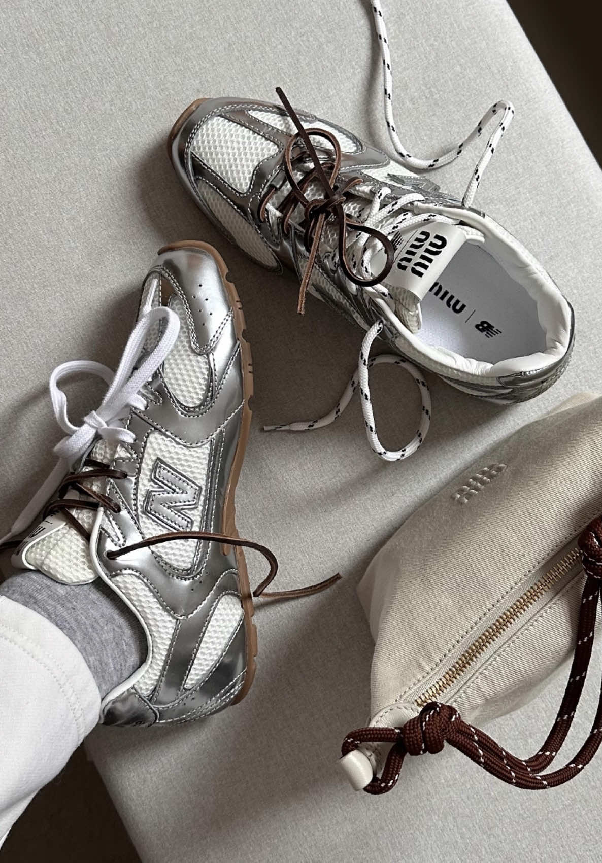 Some Miu treats to share 🍭 we’re loving the silver, are you?  #miumiu #miumiuxnewbalance #newbalance #newsneakers #sneakersaddict 