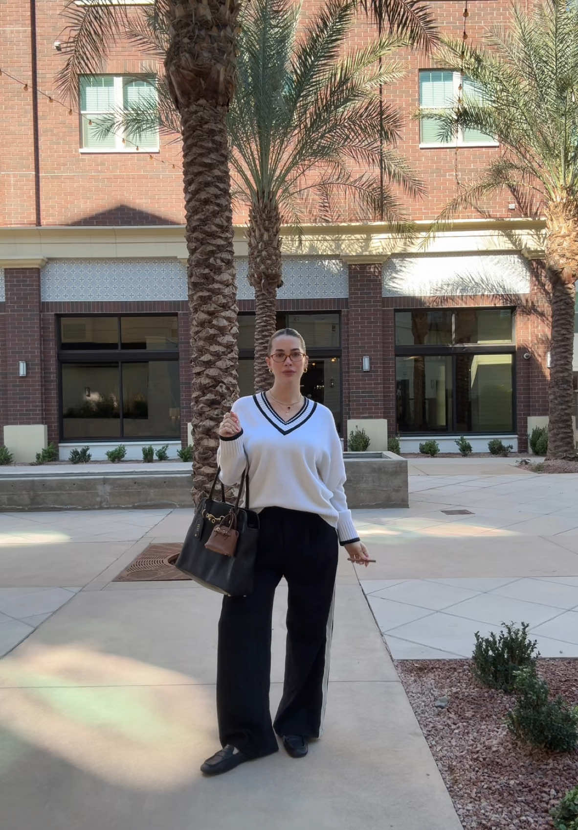 Yes my purse has a purse 🤭👜 #fyp #viral #trending #OOTD #outfit #outfitinspo #mom #MomsofTikTok #momlife @rhode skin @reformation @Miu Miu @Anthropologie 