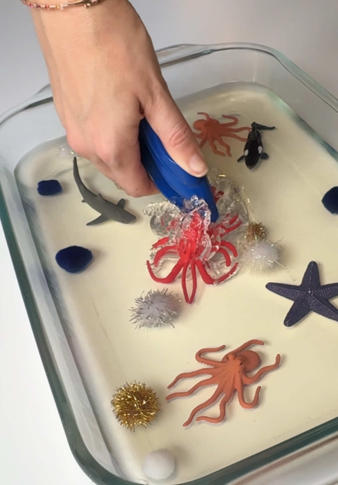 Simple, squishy, fun and taste safe. What’s better? 😜  Any type of rescue situation makes my kids feel like superheroes and this is just that 😂. Literally stuck animals that they dug out of “thick water”. You can imagine their excitement! One thing to consider ➡️. This isn’t regular jello (even though thats what I called it😜). It’s plain gelatin that doesn’t  contain sugar. You can certainly make this activity with regular jello but it will be suuuuper sticky due to the sugar😅. By using plain gelatin, you avoid the stickiness and it taste disgusting. Your little ones will most likely spit it out as soon as they try it😝. • 👉🏼YOU’LL NEED: -Gelatin  -Water -Animals or anything you want your kids to find 👉🏼INSTRUCTIONS: 1️⃣Make clear gelatin following the instructions on the box. Use only 3/4 of the recommended water to make the gelatin. This will  make it more stiff and harder to rescue the items. 2️⃣Insert the toys in the gelatin.  3️⃣Place in the refrigerator until it fully sets. 4️⃣Remove from the refrigerator and have your child rescue the items. 💡Gelatin/jello is a choking hazard. Make sure to supervise your children at all times during this activity. #mothercould  . . . #earlylearning #funforkids #learningthroughplay #DIY #motherhood #parenting #invitationtoplay #kidsactivities #teachersofinstagram #preschool #toddlerplay #homeschoolpreschool #homeschool #infancia #playathome #montessoriathome #letthekids #letthembelittle #letthemplay #momlife #babylife #babyplay #sensoryplay #montessori #preschooler  #playideas