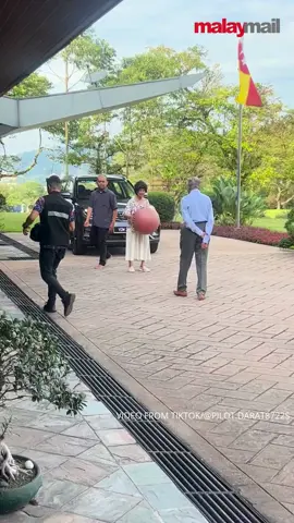 Tun Dr. Mahathir plays ball with his wife in a heartwarming display of enduring love and energy. A moment that proves age is just a number.